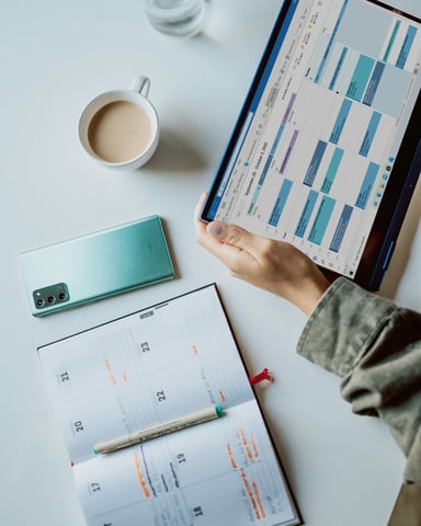 Booking calendar on tablet with planner