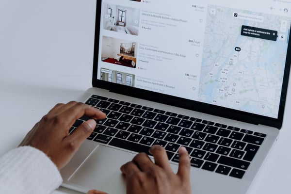 Airbnb listing on laptop screen